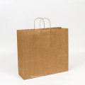 Emballage de sac-cadeau en papier pour magasin de vêtements du festival